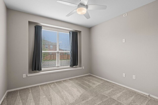 330 Conestoga Dr, Kyle, TX 78640 - unfurnished room featuring carpet flooring and ceiling fan