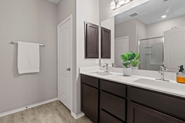 330 Conestoga Dr, Kyle, TX 78640 - full bath with a stall shower and double vanity