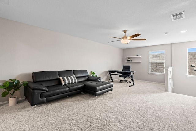 330 Conestoga Dr, Kyle, TX 78640 - living area featuring carpet floors, a ceiling fan, and a desk