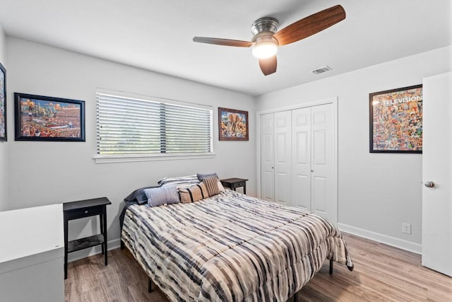 508 Explorer, Lakeway, TX 78734 - bedroom featuring wood finished floors, a closet, and ceiling fan