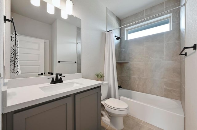 full bath featuring toilet, vanity, tile patterned flooring, and shower / tub combo with curtain
