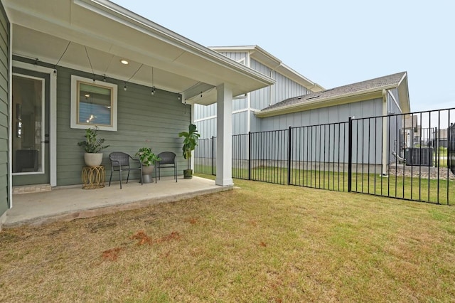 view of yard featuring a patio and fence
