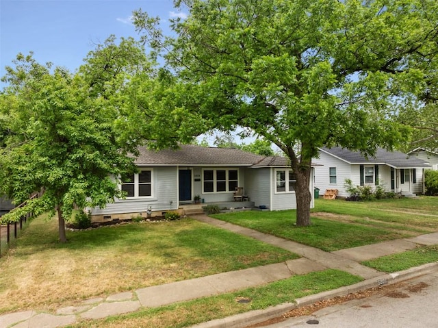 view of front of property with a front lawn and crawl space