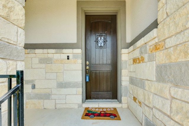 5313 Castana Bnd, Bee Cave, TX 78738 - view of exterior entry with stone siding