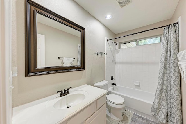 bathroom featuring shower / bathtub combination with curtain, vanity, toilet, visible vents, and tile patterned flooring