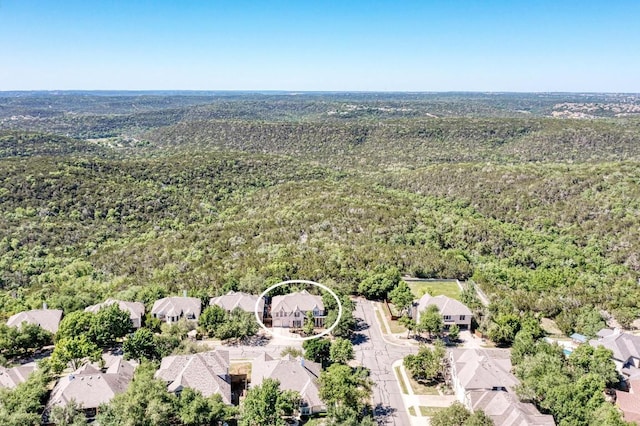 aerial view featuring a residential view and a forest view