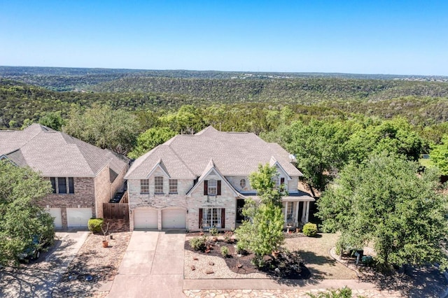8236 Phantom Canyon Dr, Austin, TX 78726 - view of subject property with a heavily wooded area