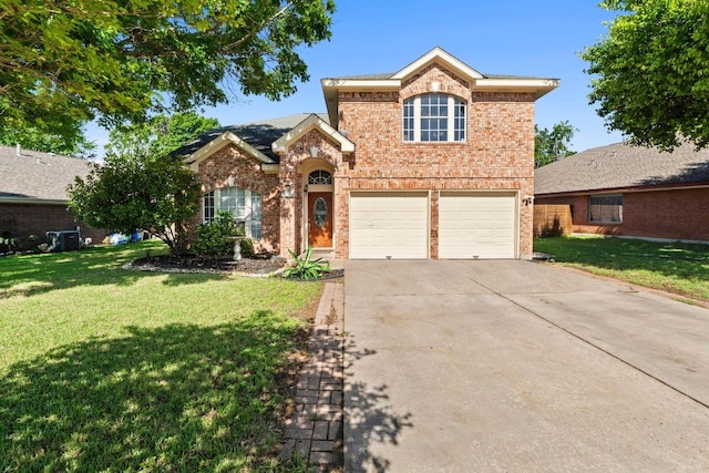traditional home with concrete driveway, a garage, a front lawn, and brick siding