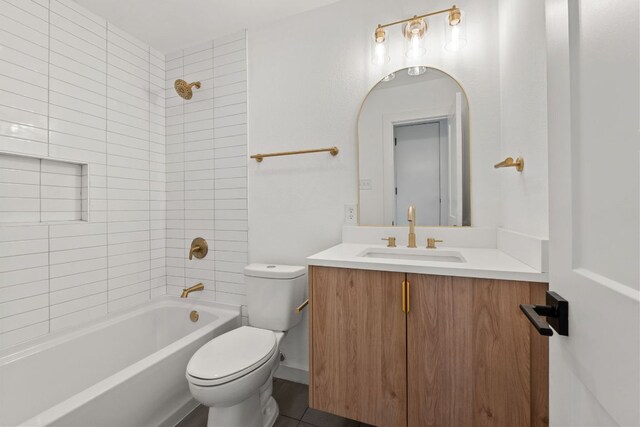 full bath with toilet, shower / washtub combination, and vanity