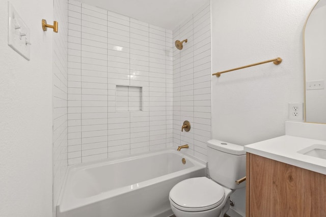 bathroom with vanity, toilet, and  shower combination