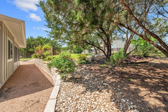view of yard featuring fence