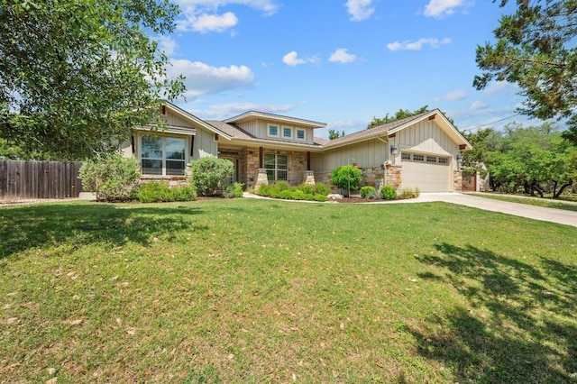 view of front of property featuring board and batten siding, concrete driveway, stone siding, fence, and a garage