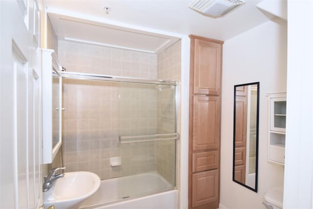 3007 Speedway Unit 6, Austin, TX 78705 - full bathroom with enclosed tub / shower combo, visible vents, toilet, and a sink