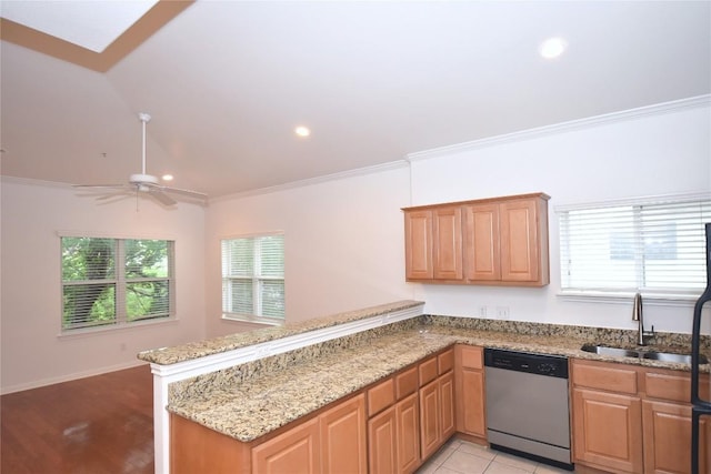 3007 Speedway Unit 6, Austin, TX 78705 - kitchen featuring stainless steel dishwasher, a sink, a peninsula, and plenty of natural light