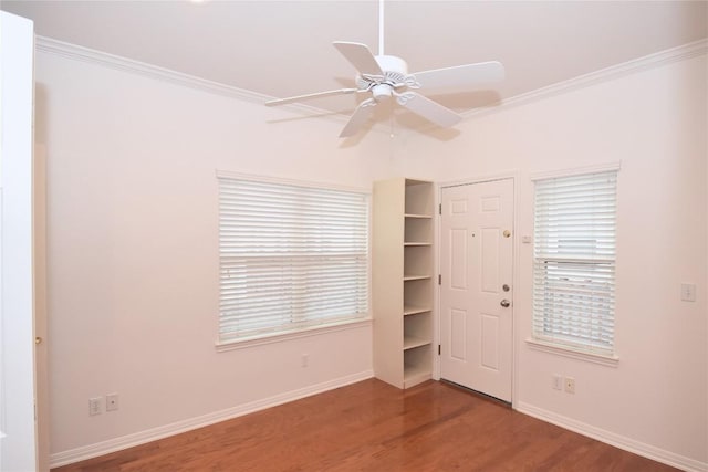 3007 Speedway Unit 6, Austin, TX 78705 - spare room featuring crown molding, a ceiling fan, wood finished floors, and baseboards