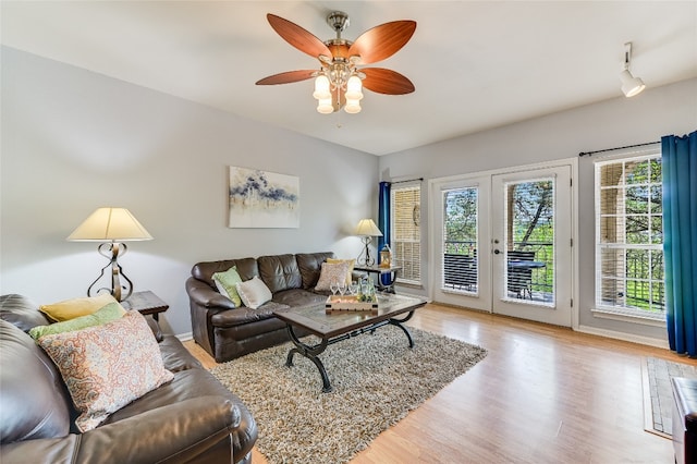 3404 American Dr Unit 3208, Lago Vista, TX 78645 - living room featuring plenty of natural light, wood finished floors, ceiling fan, and french doors