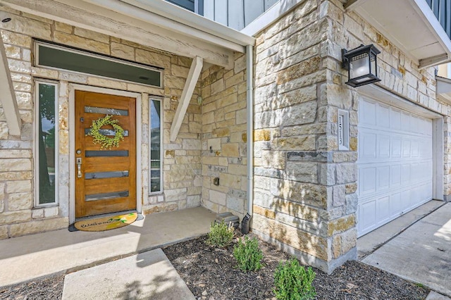 1513 Casa Dr, Austin, TX 78745 - view of exterior entry with stone siding and board and batten siding