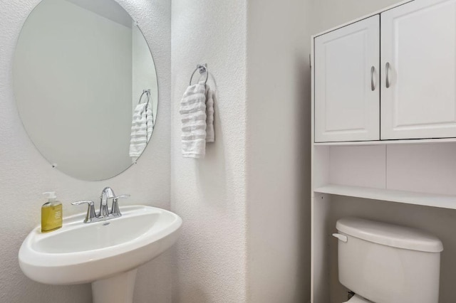 1513 Casa Dr, Austin, TX 78745 - bathroom with toilet and a sink