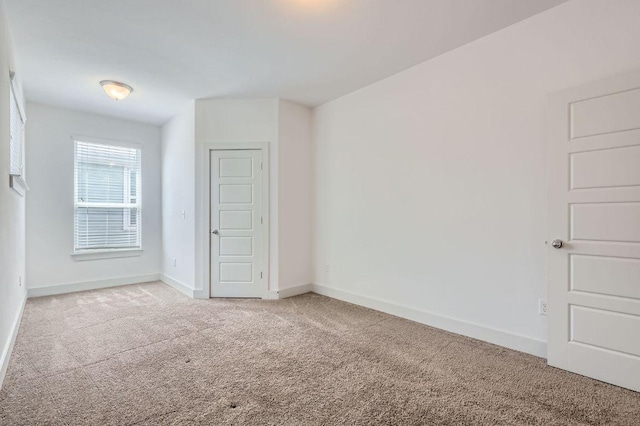 1513 Casa Dr, Austin, TX 78745 - carpeted spare room featuring baseboards
