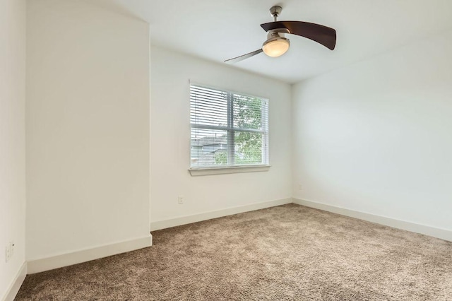 1513 Casa Dr, Austin, TX 78745 - carpeted spare room with ceiling fan and baseboards