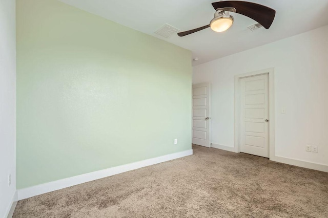1513 Casa Dr, Austin, TX 78745 - spare room with ceiling fan, carpet floors, and baseboards