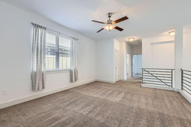 1513 Casa Dr, Austin, TX 78745 - empty room featuring attic access, carpet, ceiling fan, and baseboards