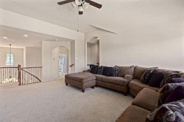 2812 Saint Rodrigo Ct, Round Rock, TX 78665 - living room with arched walkways, carpet flooring, ceiling fan, and recessed lighting