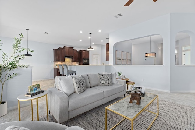 2129 Aaron Ross Way, Round Rock, TX 78665 - living room with ceiling fan and recessed lighting