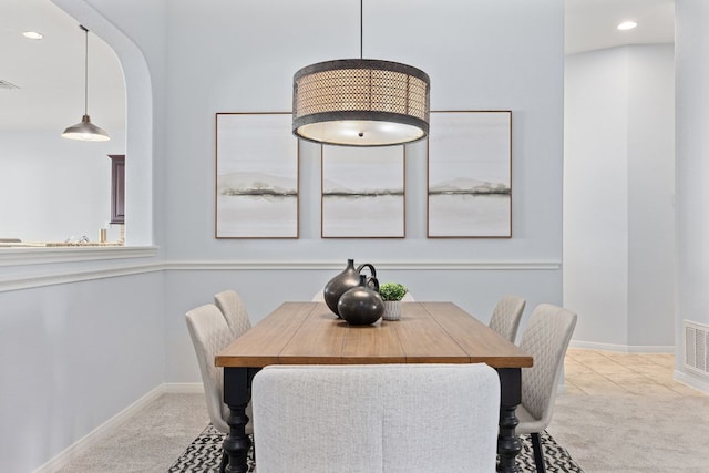 2129 Aaron Ross Way, Round Rock, TX 78665 - carpeted dining area featuring recessed lighting and arched walkways