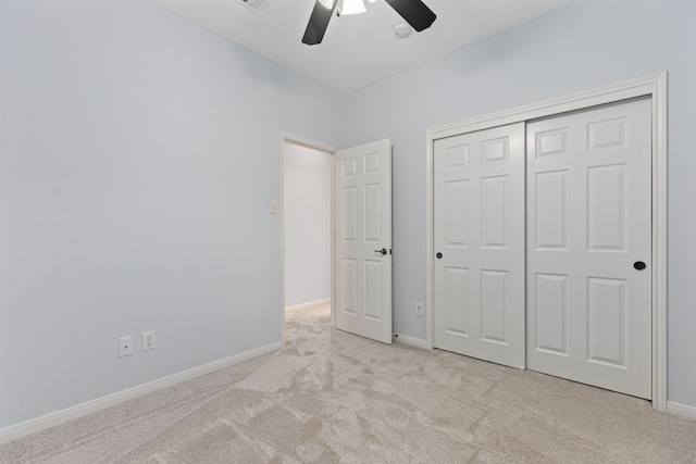 2129 Aaron Ross Way, Round Rock, TX 78665 - unfurnished bedroom featuring carpet flooring, a closet, and a ceiling fan