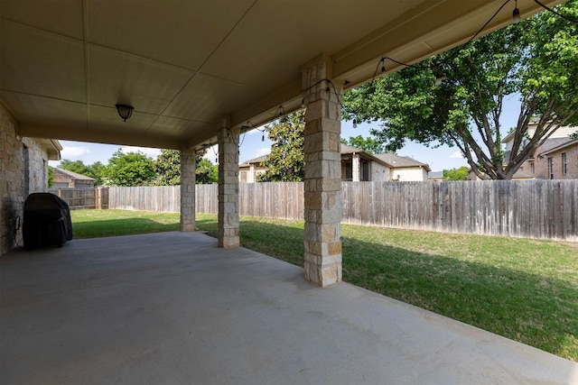 2129 Aaron Ross Way, Round Rock, TX 78665 - fenced backyard featuring a patio area and a grill