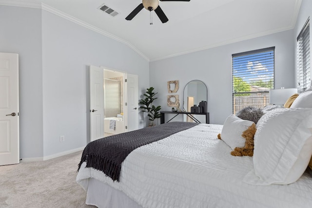 2129 Aaron Ross Way, Round Rock, TX 78665 - carpeted bedroom with ornamental molding, lofted ceiling, ceiling fan, and ensuite bath