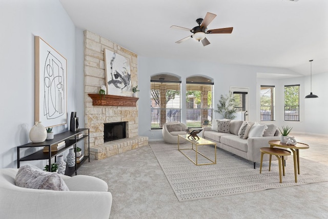2129 Aaron Ross Way, Round Rock, TX 78665 - carpeted living room with a ceiling fan and a fireplace