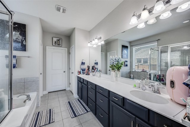 bathroom featuring a shower stall, a sink, double vanity, a bath, and tile patterned floors