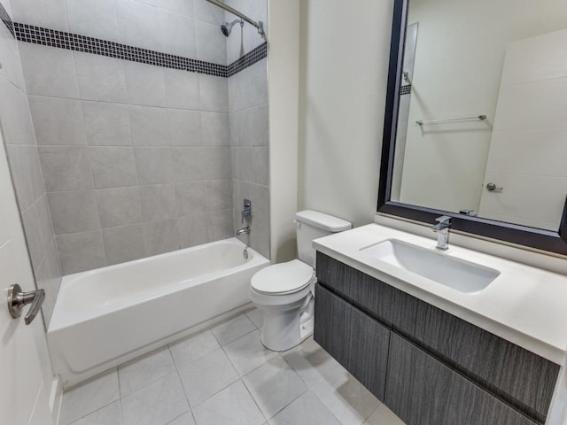 7805 Cooper Ln Unit 103, Austin, TX 78745 - bathroom with toilet, tub / shower combination, tile patterned flooring, and vanity