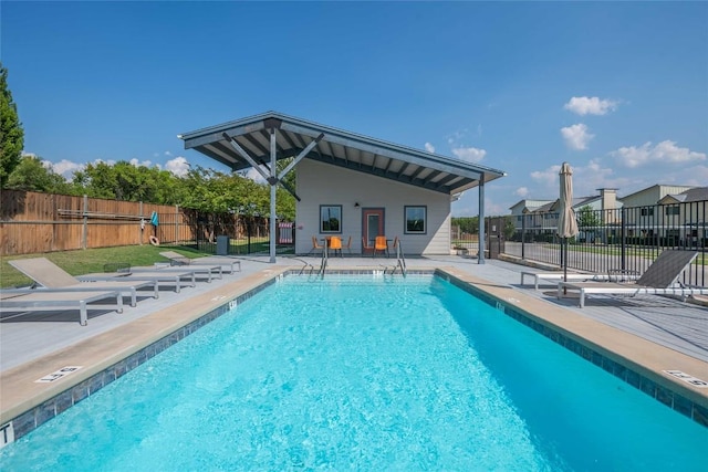 7805 Cooper Ln Unit 103, Austin, TX 78745 - community pool featuring a patio area and fence