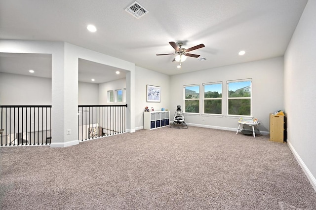 233 Abbeyville Walk, Austin, TX 78738 - unfurnished room with a ceiling fan, carpet floors, recessed lighting, and baseboards