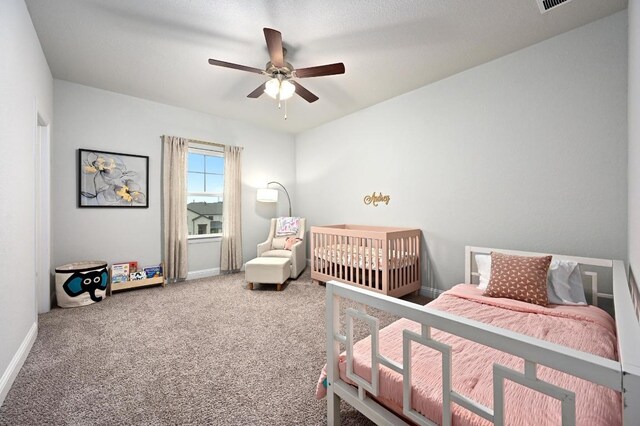 233 Abbeyville Walk, Austin, TX 78738 - carpeted bedroom featuring baseboards and ceiling fan