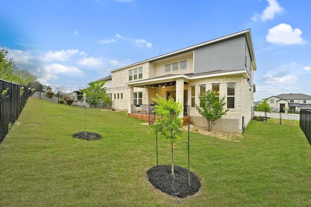 233 Abbeyville Walk, Austin, TX 78738 - rear view of property featuring stone siding