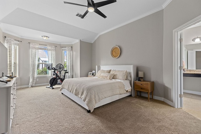 bedroom with visible vents, ornamental molding, lofted ceiling, and light colored carpet