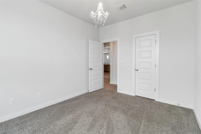 1109 Sweetspire St, Leander, TX 78641 - unfurnished bedroom featuring a chandelier, carpet floors, and baseboards