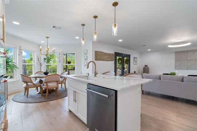 kitchen featuring recessed lighting, a sink, and dishwasher