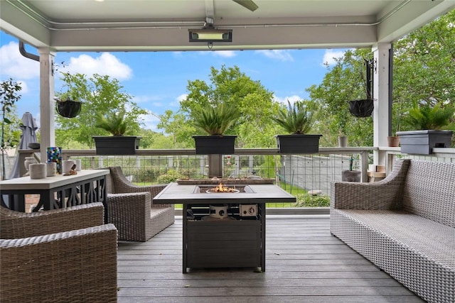 deck with an outdoor fire pit