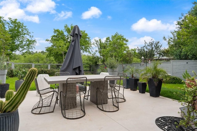 11009 Midbury Ct, Austin, TX 78748 - view of patio with a fenced backyard and outdoor dining area