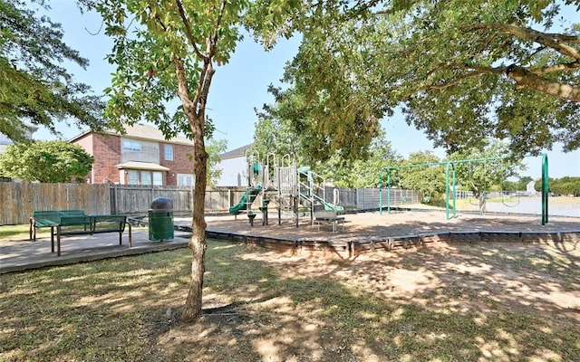 communal playground featuring fence