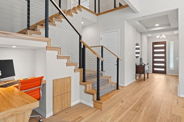 2420 Soprano Way, Round Rock, TX 78681 - entrance foyer featuring light wood-style floors, baseboards, and stairs