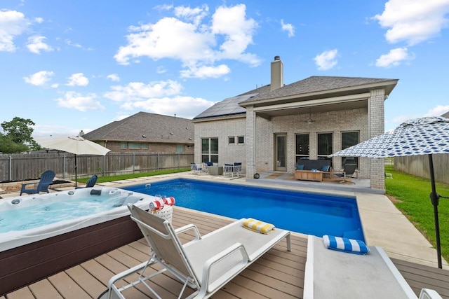 2420 Soprano Way, Round Rock, TX 78681 - view of swimming pool with outdoor lounge area, a deck, a fenced backyard, an outdoor hot tub, and a patio area