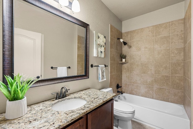 full bath with toilet,  shower combination, and vanity