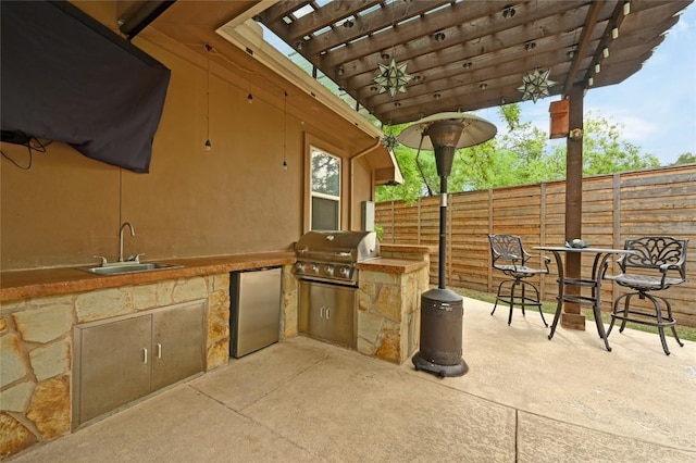 605 River Oaks Dr, Austin, TX 78748 - view of patio / terrace featuring area for grilling, fence, grilling area, a sink, and a pergola
