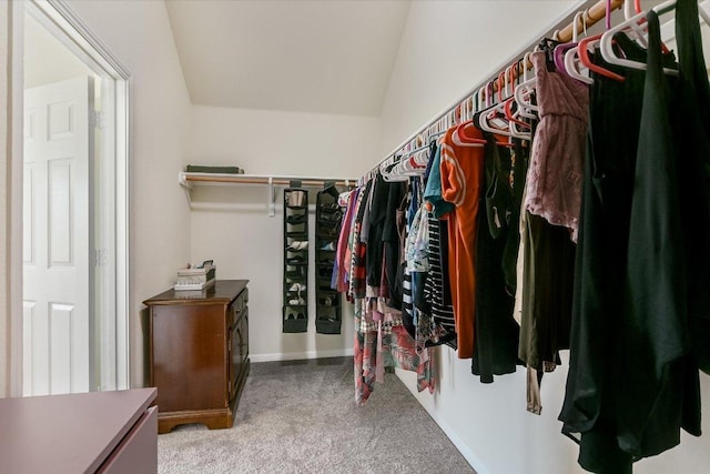 11805 Larch Valley Dr, Austin, TX 78754 - spacious closet featuring vaulted ceiling and carpet floors